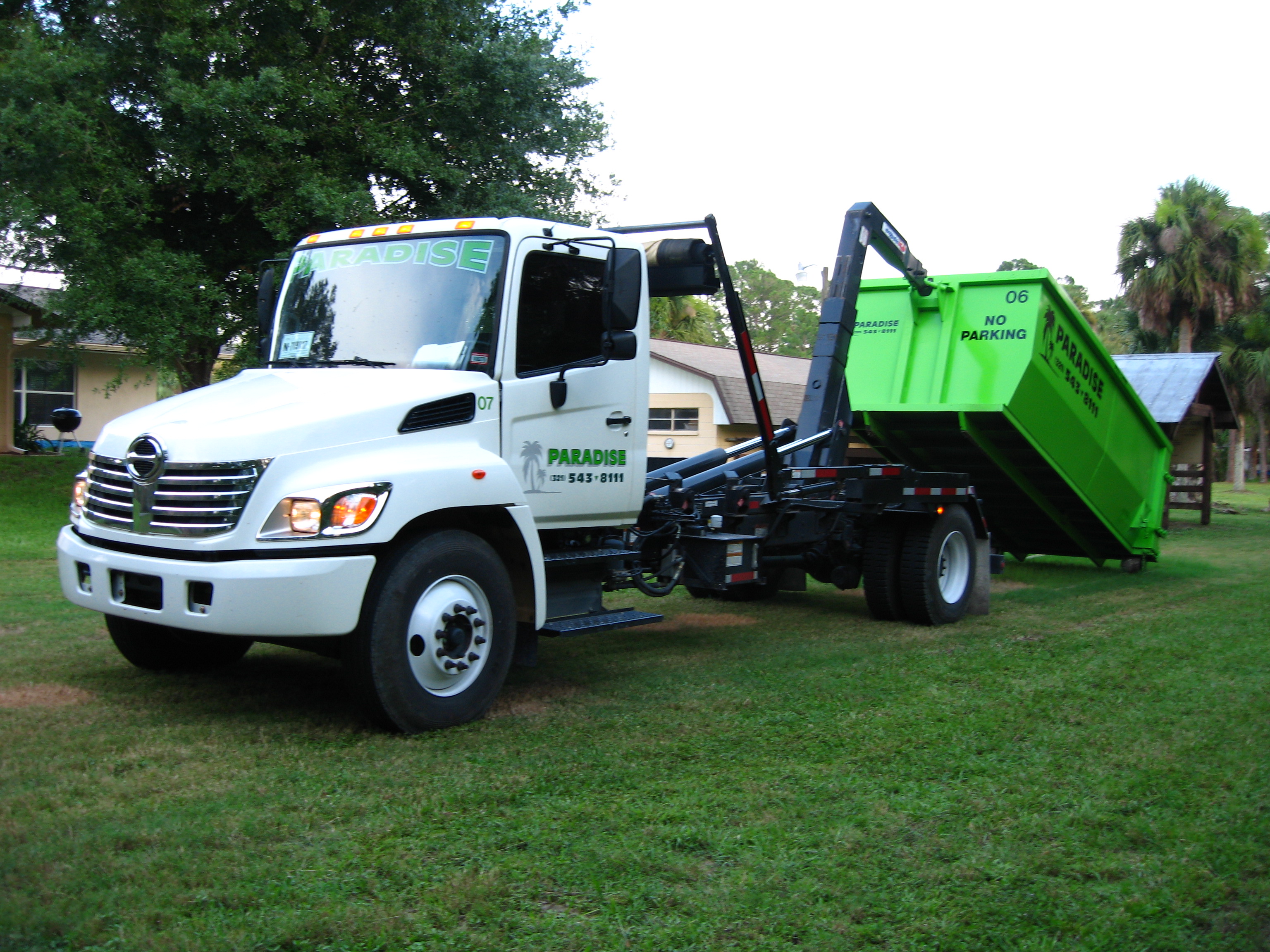 Paradise Lawn and Landscape - Roll off dumsters - Brevard County